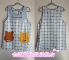 【新品】‪✿くまのがっこうエプロン‪✿ルルロロフェイスポッケ柄ブルーＭ～Ｌꕤ.·