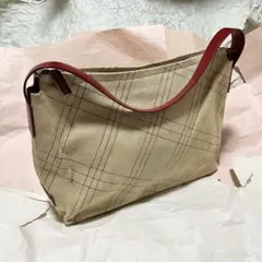 COACHのタータンチェック柄ハンドバッグです(vintage) - メルカリ