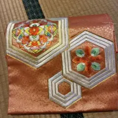 オレンジ色 名古屋帯 花柄刺繍