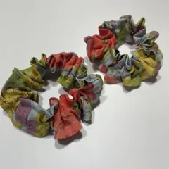 新生地☆ハンドメイドひまわりシュシュ - メルカリ