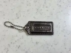 COACH コーチ チャーム レザータグ ゴールド？ブロンズ？