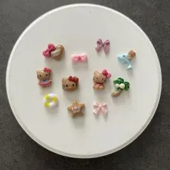 No.902 青の日焼けハローキティ ネイルパーツ6個 - メルカリ