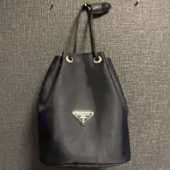 PRADA 巾着ポーチ ブラック お値下げ不可 - メルカリ