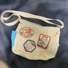 Niko and… 【Shigeki Terukina】コラボトラベルサコッシュ