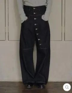 uenui ASYMMETRY BUTTON DENIM PANTS