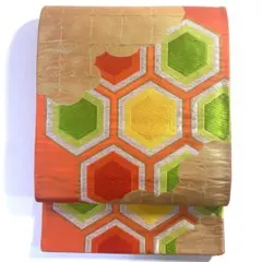 5k1923 袋帯　絹　西陣織　唐織　亀甲　橙色　金色　緑　黄色　白　柄物