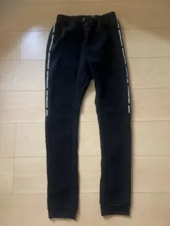 黒のADVENTUROUS SPIRITロングパンツ