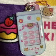 日焼けハローキティ 携帯電話型キーホルダー