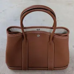 エルメス　ノベルティ　ガーデンパーティーTPM ゴールドトートバッグのサムネイル