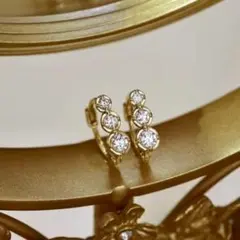 Swarovski フープピアス クリスタルチャーム付 イエローゴールド