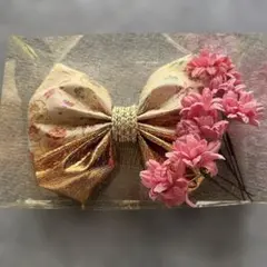 金色リボンとピンク花髪飾り
