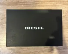 DIESEL 二つ折り財布 ブラック ゴールド 幾何学模様のサムネイル