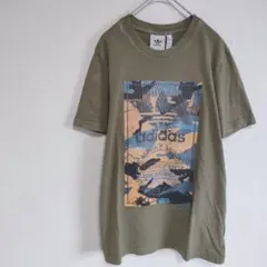 【adidas】Tシャツ カーキ カモフラ柄 トレフォイルロゴ カジュアルのサムネイル