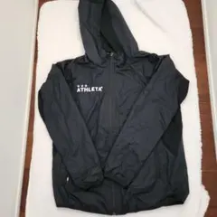 ATHLETA ブラック ピステ・ウィンドブレーカー Mサイズ
