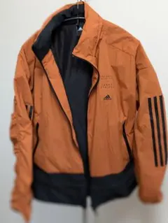 adidas オレンジ フード付きジャンパー