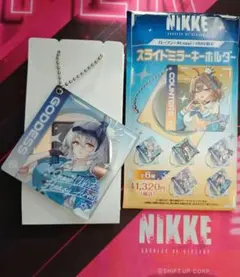 勝利の女神:NIKKE スライドミラーキーホルダー ローソンコラボ - メルカリ