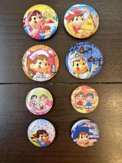 不二家 ペコちゃん 缶バッジ 8点セット　ポコちゃん　お仕事編　海外旅行編のサムネイル