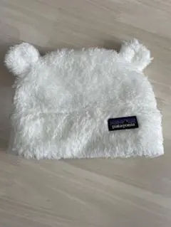 新品未使用Patagonia ホワイト ベビー帽子3-6M