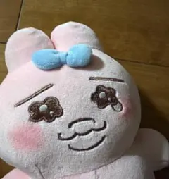 リボン付きピンクぬいぐるみ