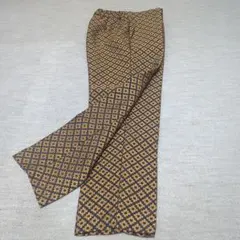 Mサイズ 黒とオレンジのカジュアルパンツ