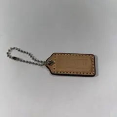 COACH ベージュレザー タグチャーム