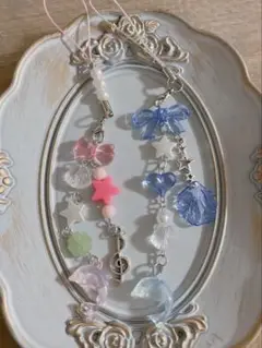 ピンクイルカと水色イルカのストラップ