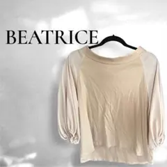 BEATRICE ベアトリス 後ろリボン バルーン袖 異素材 ベージュ 38のサムネイル