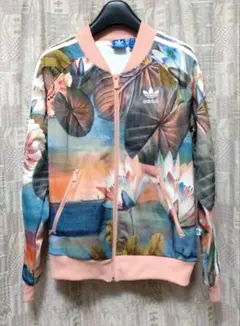 【新品】 originals 花柄 ピンク アノラックパーカー 新品】adidas originals 花柄 ピンク アノラックパーカー - メルカリ