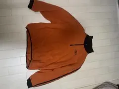 オレンジ フリース ハーフジップジャケット