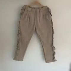 nino ニノフリル付きベージュロングパンツ　130