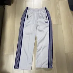 needlesニードルス トラックパンツ ストレート 白紫 未開封 - メルカリ