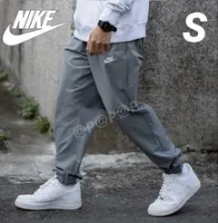 新品 NIKE ナイキ ウーブン ジョガーパンツ 裾絞り グレー S