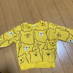 クマ柄の黄色トレーナー