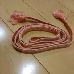 ピンクの編み込み帯締め フリンジ付き