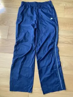 NIKE ナイキ ウィンドブレーカーパンツ　レディース　L ネイビー