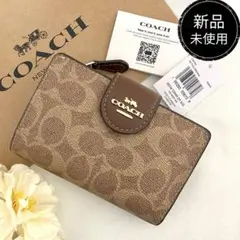 未使用箱付き】COACH 二つ折り財布 シグネチャー ブラウン - メルカリ