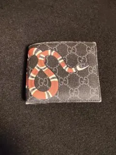 美品】GUCCIクーリエGGスプリーム2つ折り財布(型番473905) - メルカリ