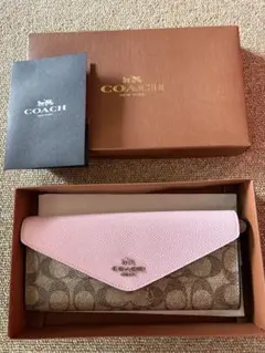 COACH 長財布 シグネチャー ピンク ストラップ付 - メルカリ