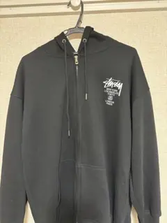 stussy パーカー Lサイズ ブラック 黒 メンズ WORLD TOUR