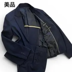 コムサイズム パンツスーツセットアップ M 紺 ストライプ 通勤 洗える 美品のサムネイル