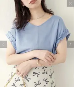 新品未使用 osono前後2WAY袖口ミニフリルブラウスのサムネイル