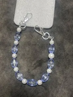 ハンドストラップ8mmパール×楕円デザインビーズクリアブルー金具シルバー