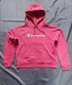 Champion ピンク フード付きパーカー