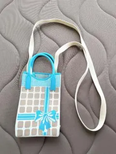 リボンモチーフのショルダーバッグ