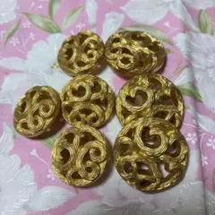 金色の装飾的なボタンセット