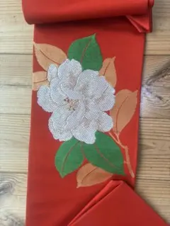 名古屋帯 朱色 椿 刺繍 華やかのサムネイル