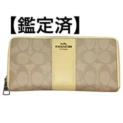 【鑑定済】COACH ロゴ入り 長財布 ベージュ/イエロー　シグネチャー