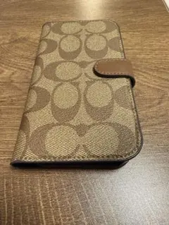 COACH iPhone14 手帳型ケース シグネチャーカーキ - メルカリ