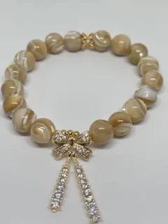 124.大特価❗️天然石❗️マザーオブパール（茶）ブレスレット❗️リボンデザイン❗️