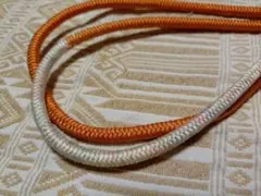 オレンジと白の帯締め